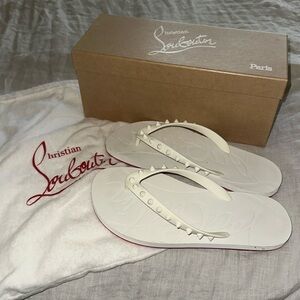 Christian Louboutin spike flip flops